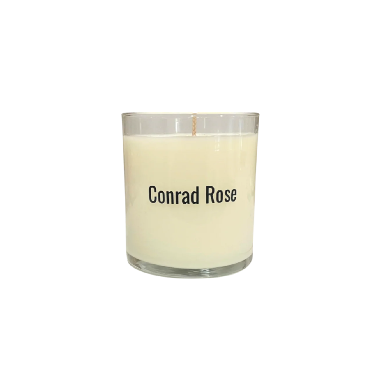 Candle in a glass jar with 'Conrad Rose' branding on a white background