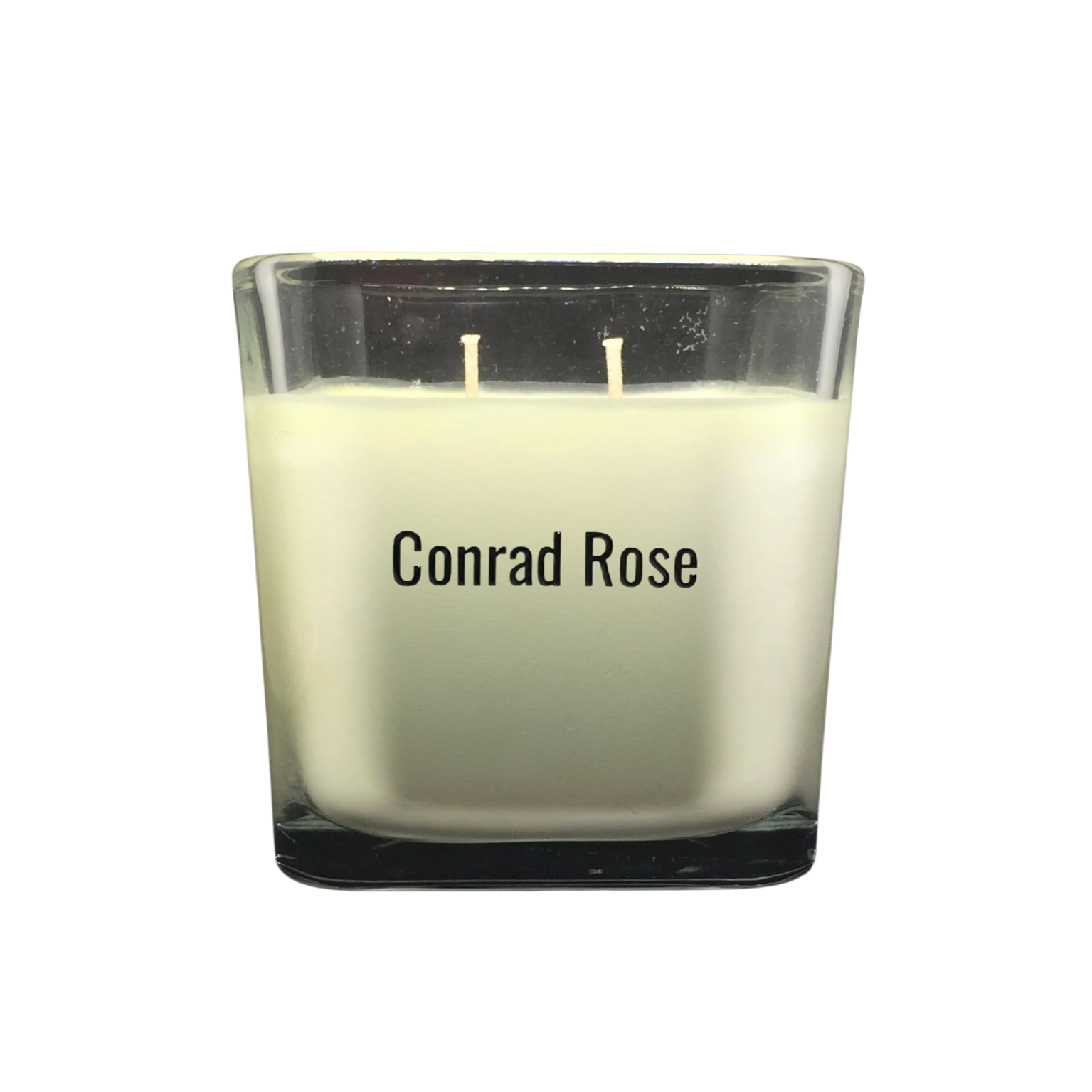 Candle with 'Conrad Rose' branding on a white background